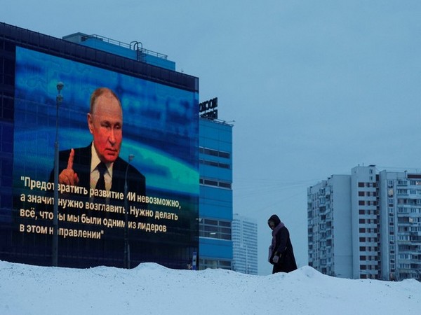 A screen shows a quote from Russian President Vladimir Putin's press conference in Moscow (Photo Credit: Reuters)