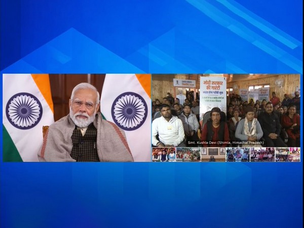 Prime Minister Narendra Modi interacts with beneficiaries of Viksit Bharat Sankalp Yatra (Photo/ANI)