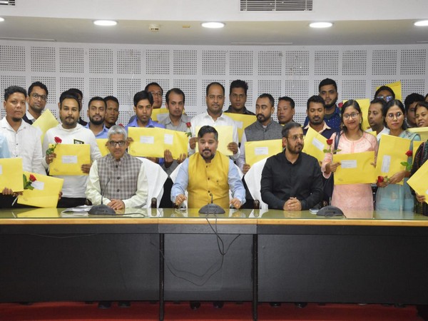 Tripura Minister for Food Sushanta Chowdhary distributes appointment letters to LDC candidates in Agartala