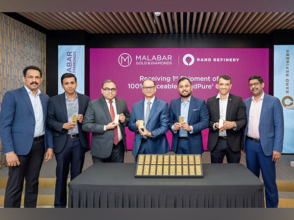 Malabar Gold & Diamonds' Shamlal Ahamed, MD - International Operations, receives the inaugural batch of ‘RandPure’ gold from Rand Refinery's CEO Praveen Baijnath and CFO Dean Subramanian