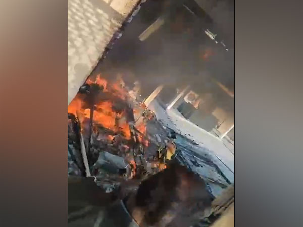 Police rescue five people after fire broke out at an apartment in Hyderabad on Friday (Photo/ANI)