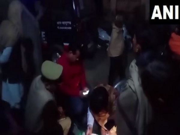 Police officials at the village where fire incident occurred (Photo/ANI)