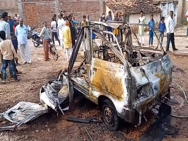 Omni van catches fire in market area of Chhatarpur. (Photo/ANI)