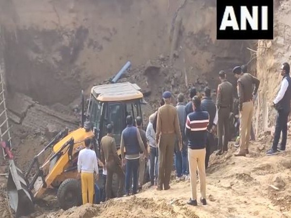 Temple wall collapses in Gurugram, five workers feared trapped. (Photo/ANI)