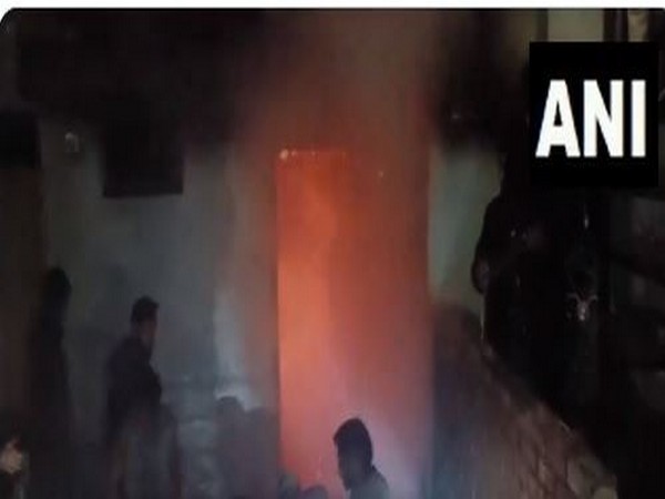 Dousing operation underway at the footwear store in Poonch. (ANI/Image)