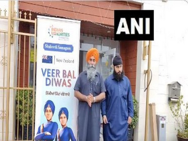 Members of the Sikh community Kamaljit Singh and Jaspreet Singh celebrate Veer Bal Diwas at Begampura Gurudwara Sahib in Auckland, New Zealand (Photo/ANI)