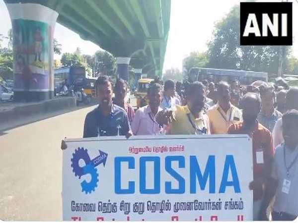 Industrial workers hold protest march in Tamil Nadu's Coimbatore over power tariff hike (Photo/ANI)