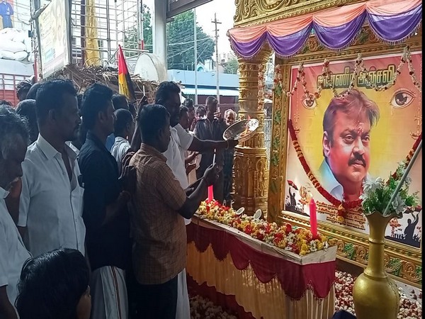 DMDK cadres pay tribute to DMDK founder and actor Vijayakanth in Kancheepuram. (Photo/ANI)