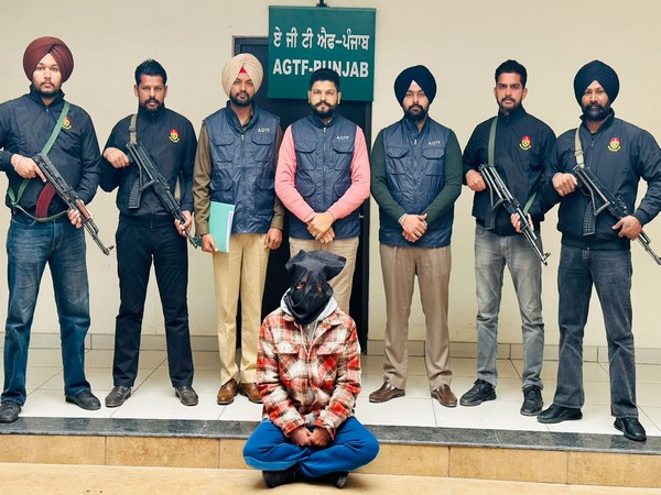AGTF Punjab with arrested gangster Vikramjit Singh on Thursday. (Photo/X)