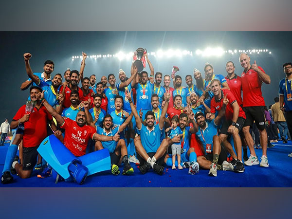 Indian team posing with the Asian Champions Trophy. (Photo- HI Media)