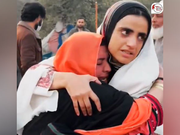 Baloch activist Mahrang Baloch consoles a woman crying for her brother (Image Credit: X/@IFazilaBaloch)