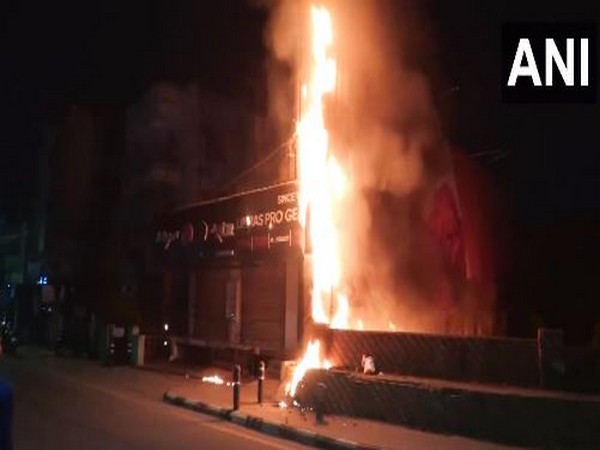 Display board installed outside the shop went up in flames. (Photo/ANI)