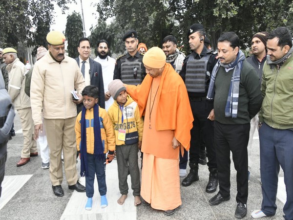 Chief Minister Yogi Adityanath with students. (Photo/ANI)