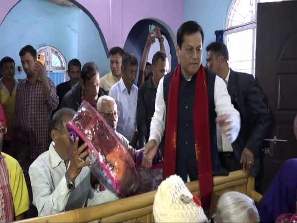 Union Minister Sarbananda Sonowal visits old age home in Dibrugarh. (Photo/ANI)