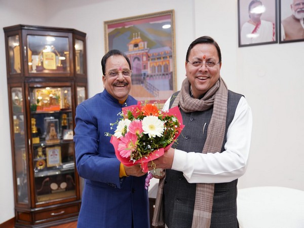 MoS for Defense and Tourism, Ajay Bhatt pays courtesy visit to Uttarakhand CM Pushkar Singh Dhami. (Photo/ANI)