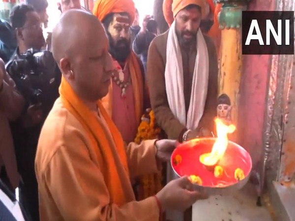 Uttar Pradesh Chief Minister Yogi Adityanath at Hanumangarhi temple (Photo/ANI)