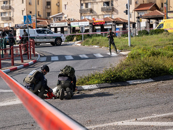Israeli sappers examine the remains of a rocket that fell in the northern city of Kiryat Shemona (Photo/TPS)