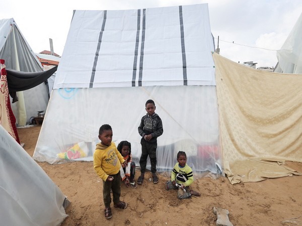 Displaced Palestinians, who fled their homes due to Israeli strikes, shelter at a tent camp in Rafah (Photo/Reuters)