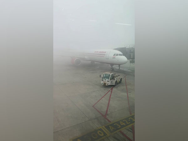 Dense blanket of fog envelops IGI Airport in New Delhi (Photo/ANI)