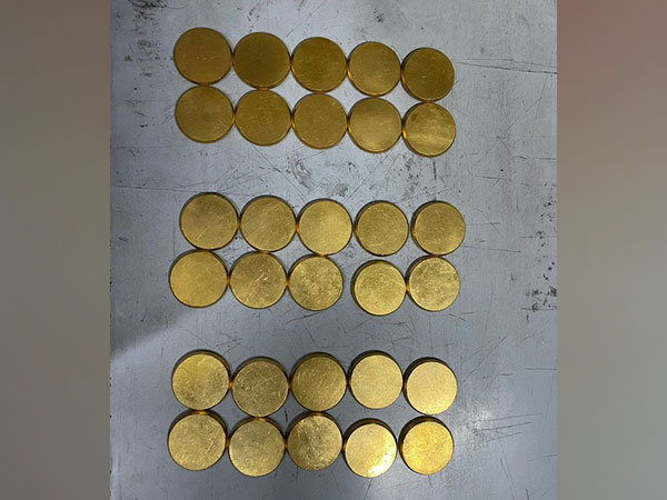 Seized gold coins (Photo credit/ AIU of Trichy airport)