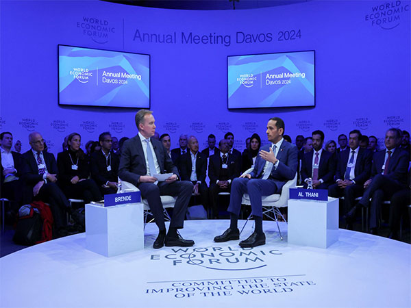 Qatari PM Mohammed bin Abdulrahman Al Thani speaks with President of World Economic Forum Borge Brende (Photo/Reuters)