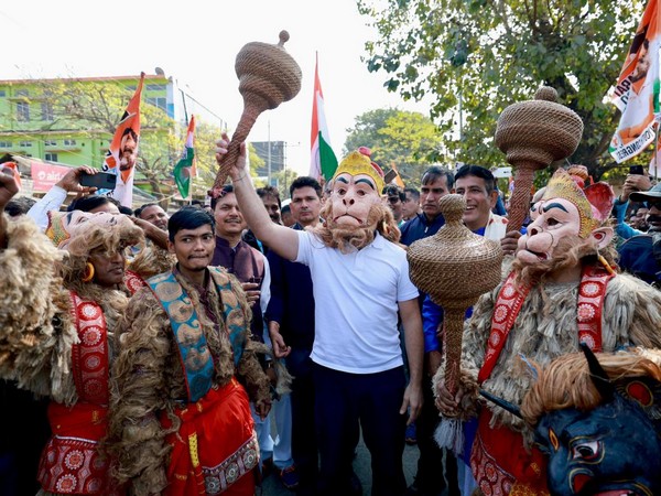 Congress Leader Rahul Gandhi dons Hanuman mask (Photo/Twitter: Assam Congress)