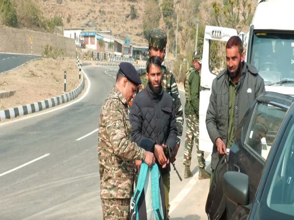 Security personnel at Jammu-Srinagar National Highway (Photo/ANI)