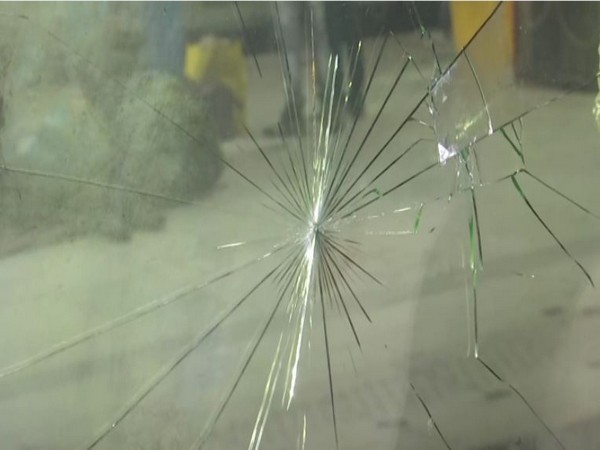 Damaged windowpane of Howrah-New Jalpaiguri Satabdi Express train (Photo/ANI)