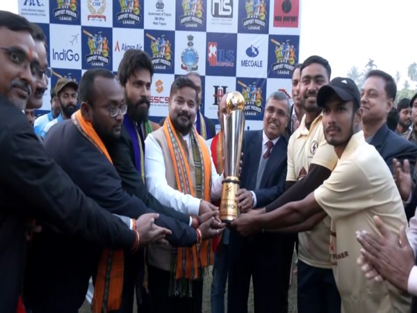 Tripura Minister Sushanta Chowdhury hands trophy to Team Electrical (Photo: ANI)