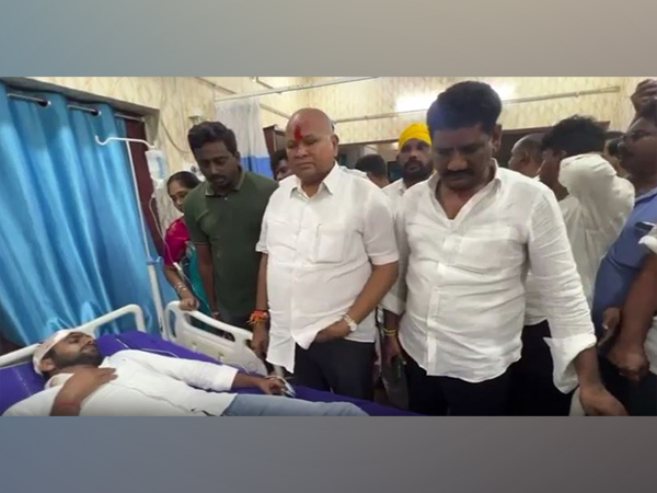 TDP leader Kanna Lakshminarayana visits injured PRO at hospital (Photo/ANI)