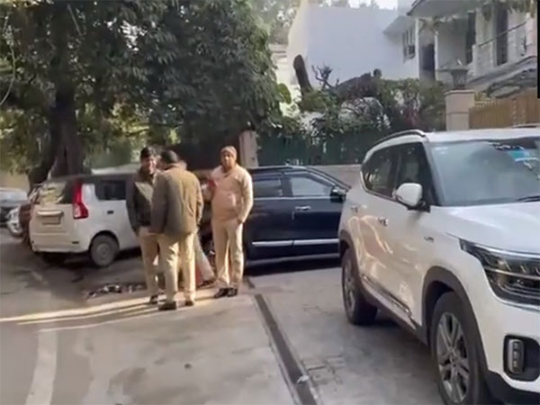 Police teams outside AAP MP ND Gupta's house (Photo/ANI)