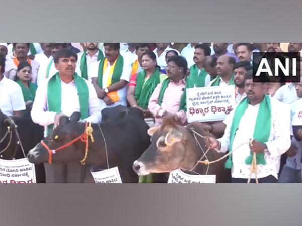 BJP workers take out a protest at Freedom Park in Bengaluru. (Photo/ANI)