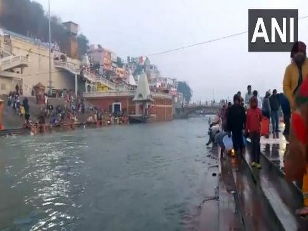 Devotees take holy dip in Ganga on Mauni Amavasya in Haridwar (Photo/ANI)