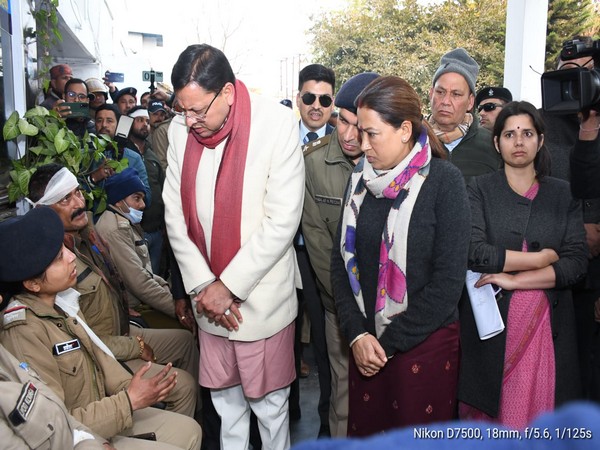 Chief Minister Pushkar Singh Dhami meeting injured policemen in Haldwani (Photo/ANI)