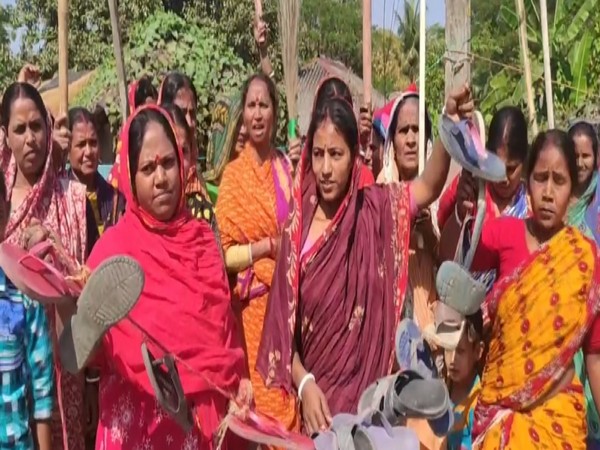 Agitated villagers protest against TMC leader Shivprasad Hazra (Photo/ANI) 