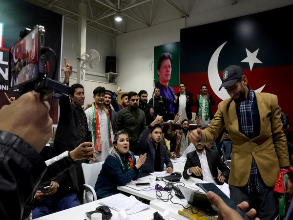 PTI supporters watch the general election results at a PTI officein Islamabad, Pakistan (Photo/Reuters)