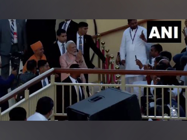Prime Minister Narendra Modi meets artisans of the BAPS Hindu Temple in Abu Dhabi, UAE on Wednesday (Photo/ANI)