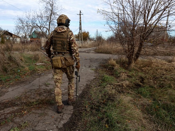 Member of Ukraine's National Guard Omega Special Purpose walks in front line town of Avdiivka (Photo/Reuters))