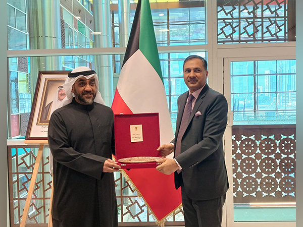 Indian envoy Adarsh Swaika with Kuwait Minister Abdullah Hamad AlJouan (Photo/@indembkwt)
