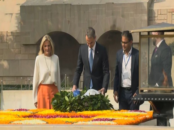 Prime Minister Kyriakos Mitsotakis and with his wife Mareva Grabowski-Mitsotakis pay tribute to Mahatma Gandhi (Photo/ANI)