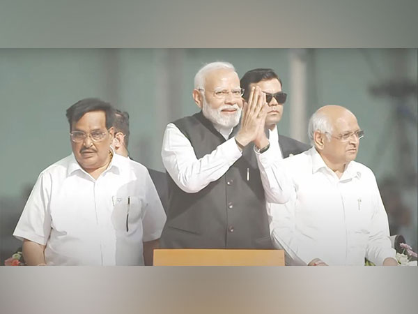 Prime Minister Narendra Modi hold mega roadshow in Navsari (Image/ANI)