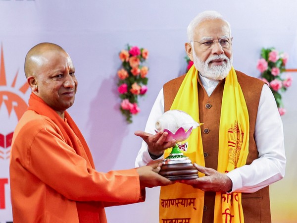 Uttar Pradesh CM Yogi Adityanath with PM Narendra Modi who attended the prize distribution ceremony of Sansad Sanskrit Pratiyogita winners (Photo/ANI)
