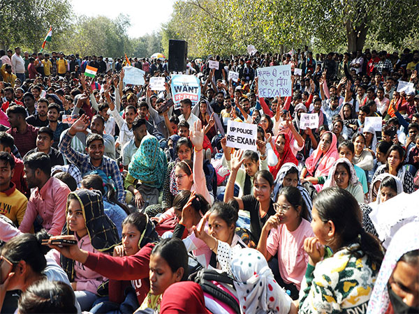 Visuals of candidates holding placards during a protest over the paper leak issue (File Photo/ANI)