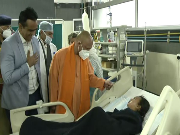 UP CM Yogi meets victims in hospital. (Photo/ANI)