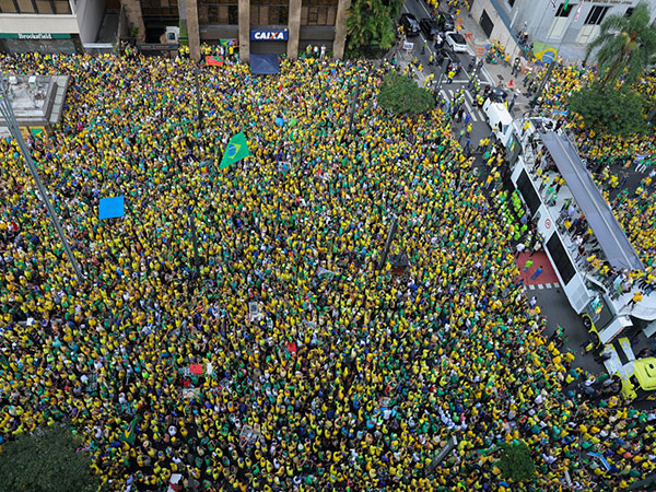 Former Brazil PM denies coup plot as thousands rally in Sao Paulo