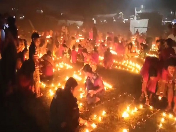 Assam BJP workers and local light up Diyas to welcome CM  Himanta Biswa Sarma. (Photo/ANI)
