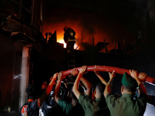 Fire broke out in a multi storey building in Dhaka (Photo/Reuters)
