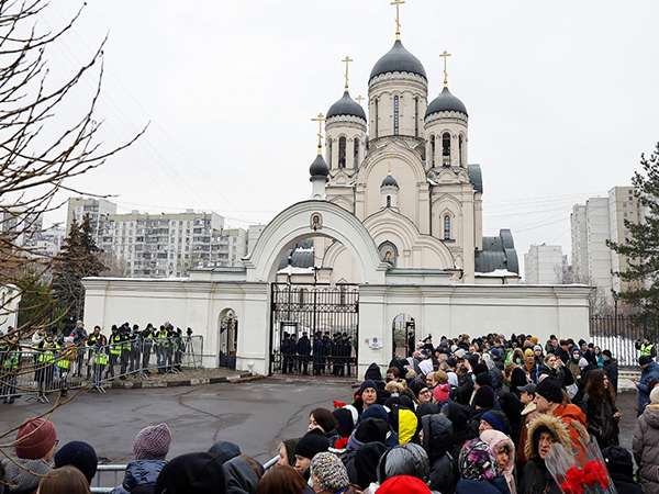 People gather outside Soothe My Sorrows church as they wait for a funeral service for Russian opposition politician Alexei Navalny in Moscow (Picture credit/ Reuters)