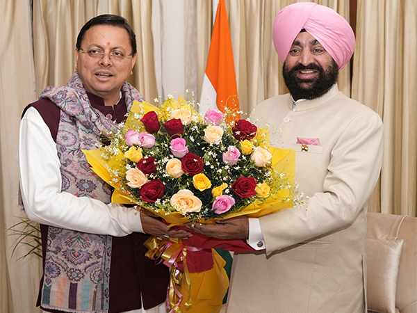 CM Dhami meets Lt Guv Gurmeet Singh (Photo/ANI)