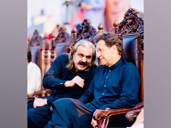 Pakistan Tehreek-e-Insaf leader Ali Amin Gandapur (left) with party founder Imran Khan (Photo/X@AliAminKhanPTI)